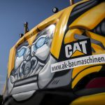 Bagger von CAT / Zeppelin mit Graffiti, 26.07.18